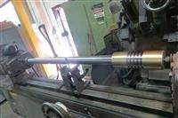 : High-Pressure Piston Rod with Sprayed on Bronze Riders
